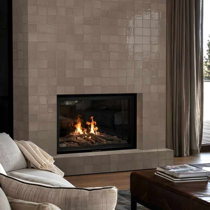 Terranello Umber 4" x 4" Glossy Kitchen & Bathroom Tile with a fireplace, couch and table