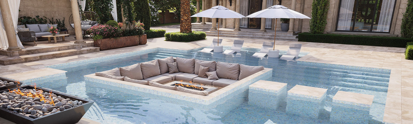 Outdoor pool area with lounge seating and umbrellas in a luxurious setting