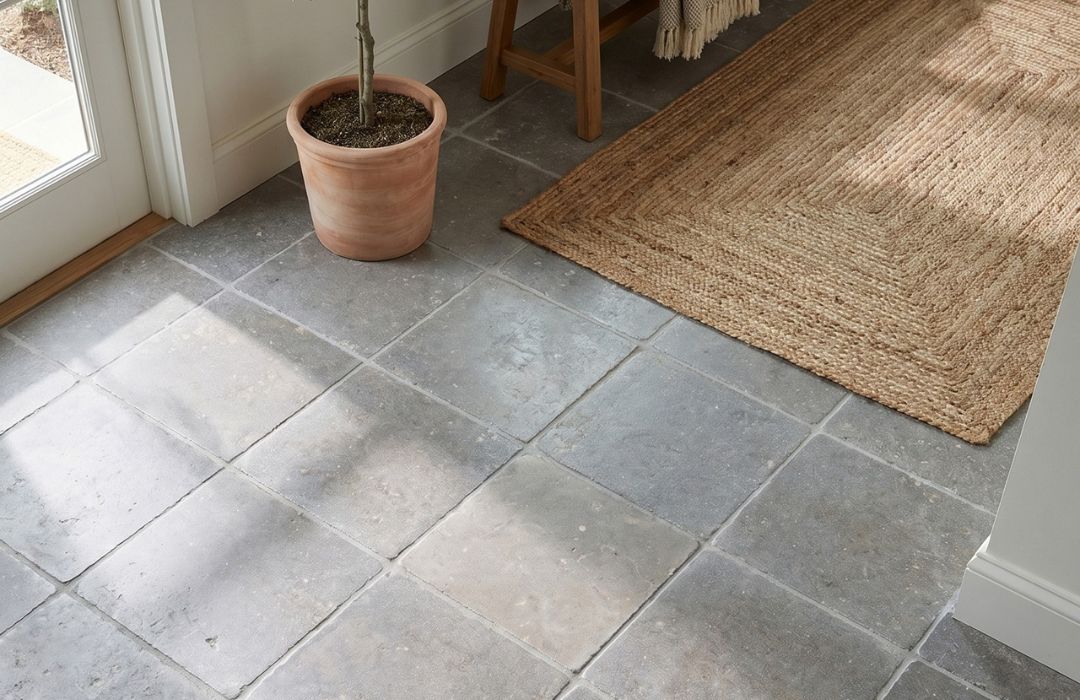 tumbled tile series with a rug and potted plant