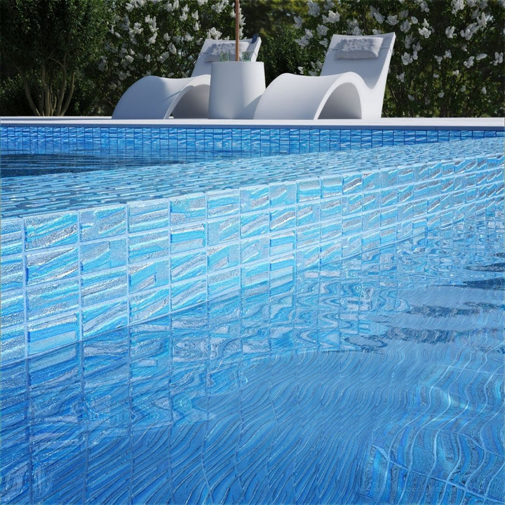 blue mosaic glass tile on pool waterline