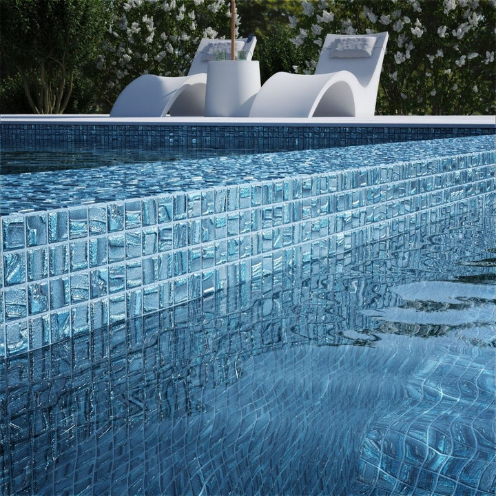 blue mosaic glass tile on pool waterline