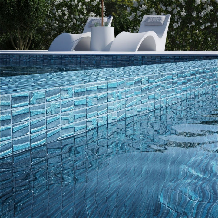 blue mosaic glass tile on pool waterline
