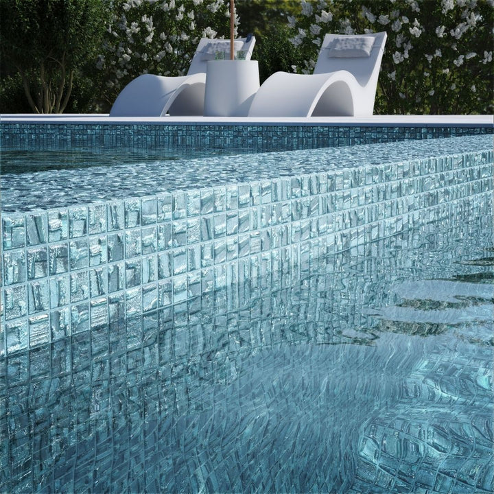 silver mosaic glass tile on pool waterline
