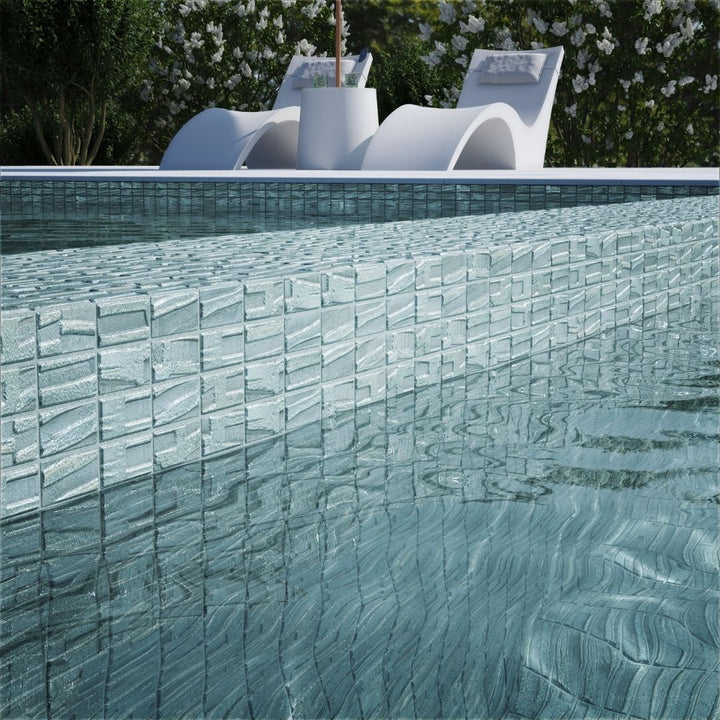 silver mosaic glass tile on pool waterline