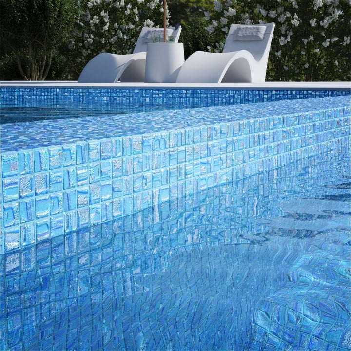 blue mosaic glass tile on pool waterline