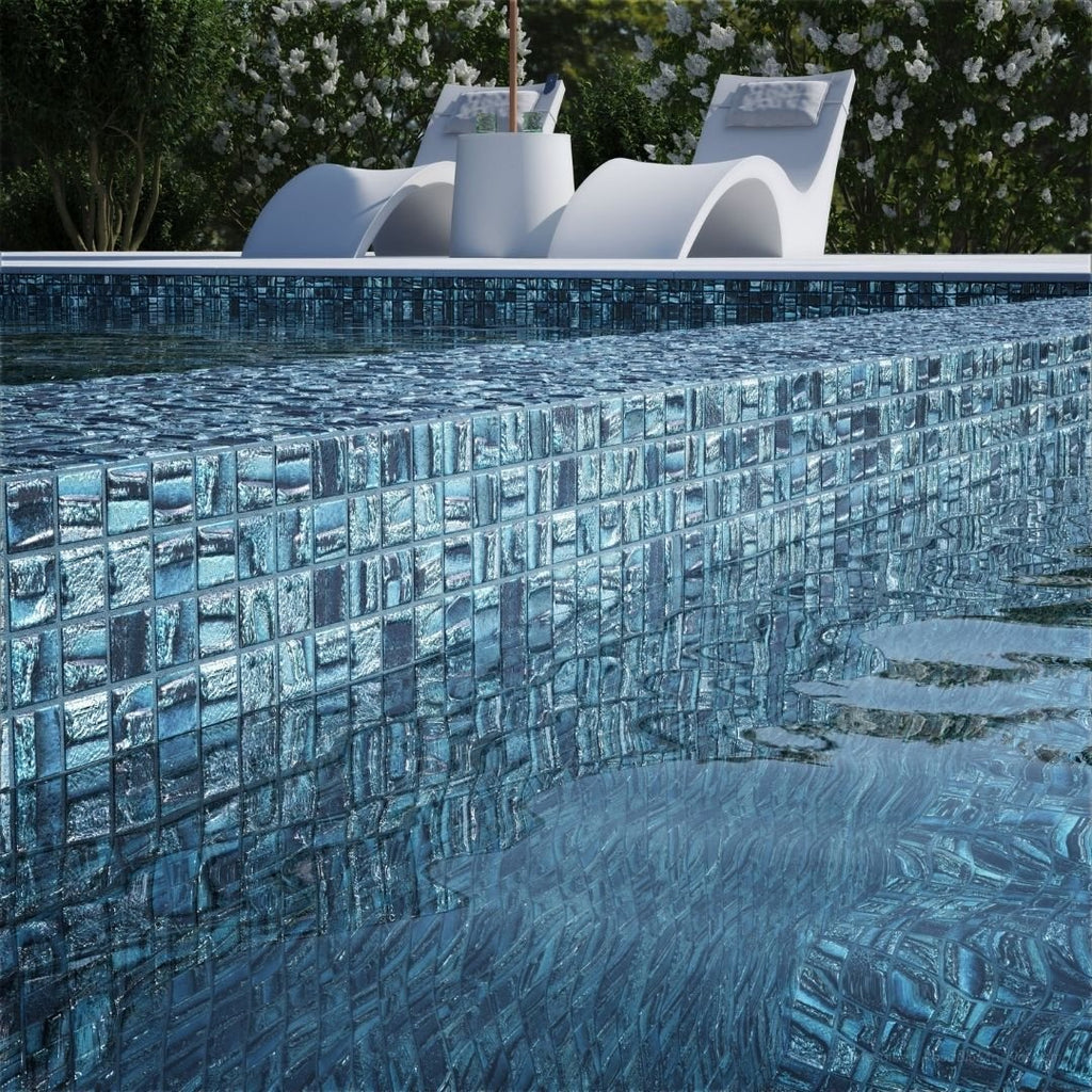blue mosaic glass tile on pool waterline