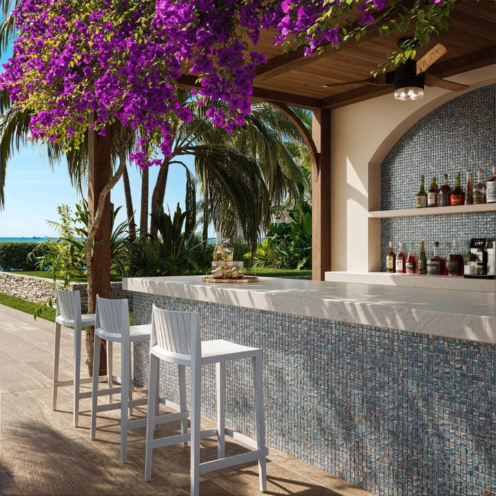 grey mosaic glass tile in outdoor and kitchen and bar area with barstools