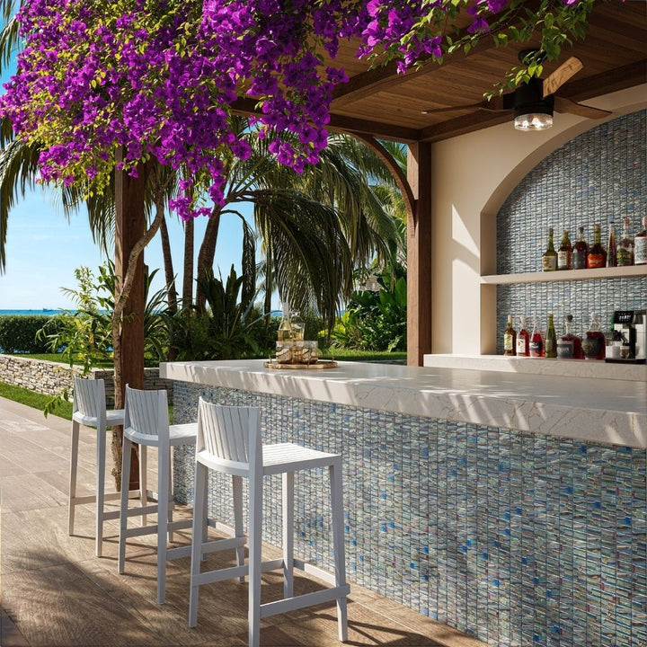 grey mosaic glass tile in outdoor and kitchen and bar area with barstools