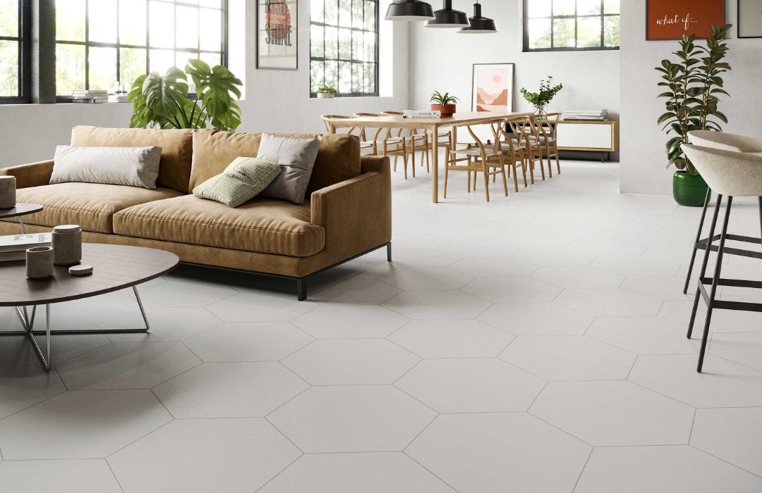 argos series porcelain tile in a kitchen and dining area with a couch, chairs and table