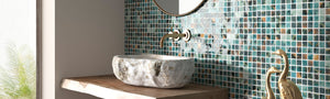 Estelar series glass mosaic tile by Vidrepur on bathroom vanity wall