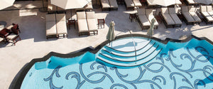 Mosaic glass tile on swimming pool floor