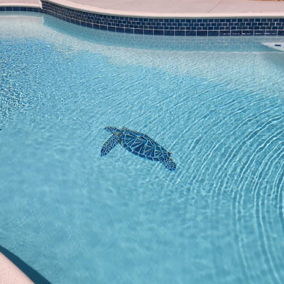 glass sea turtle pool mosaic installation