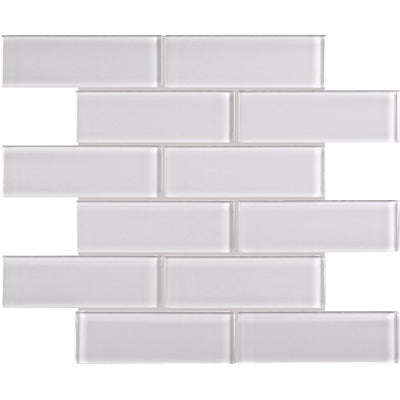 A rectangular glass tile in a white color, from the Element Series by Tesoro.