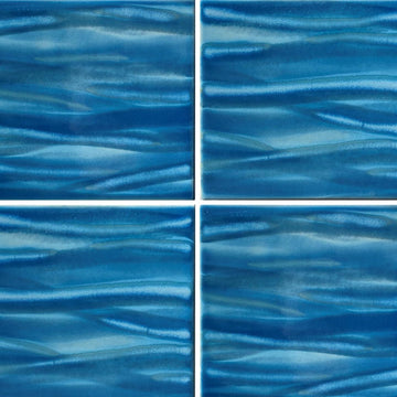 A set of four blue porcelain pool tiles with a wavy pattern.